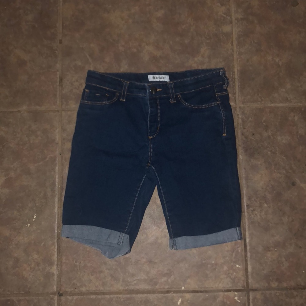 Dark wash denim shorts from the brand tractr